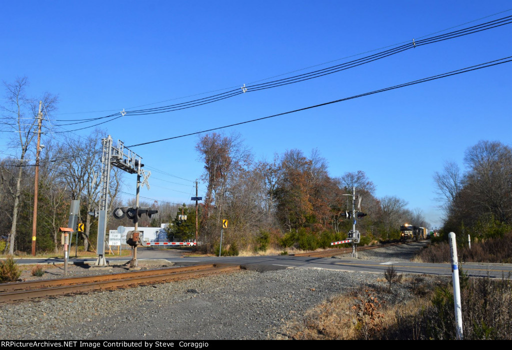 NS 211 is approaching the Valley Road Grade Crossing